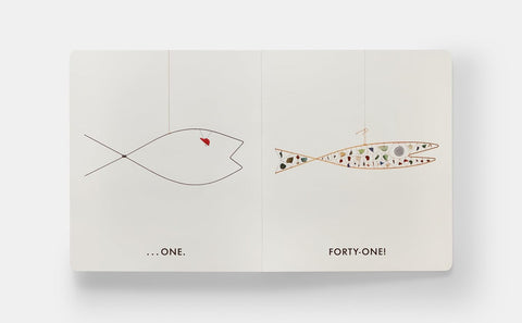 Book with illustrations of a fish and a patterned fish, labeled 'One.' and 'Forty-One!' on a white background.