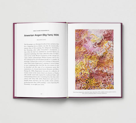Open book with text and a colorful abstract painting on a white background