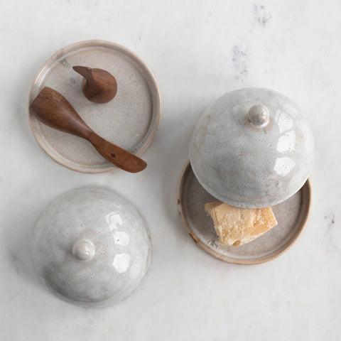 Glazed Domed Stoneware Dish with butter and wood utensils
