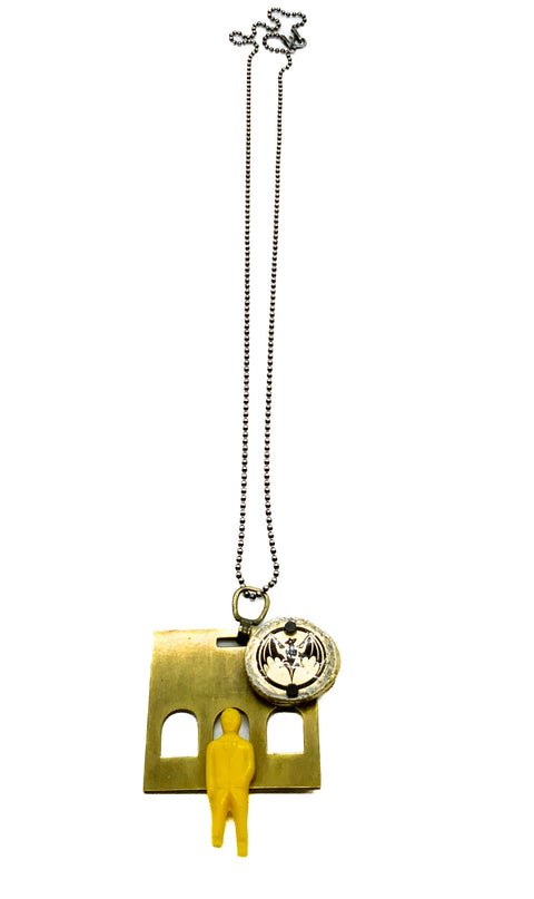 A necklace with different objects.