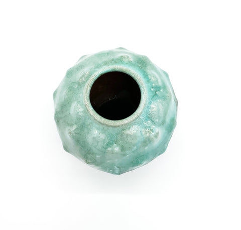 Textured vase in two tones, mint and dark green.