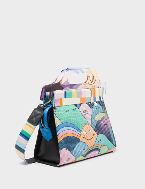 Colorful handbag with cartoon designs on a white background