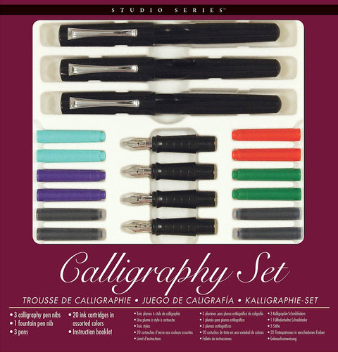 Calligraphy set with pens and ink cartridges on a purple background