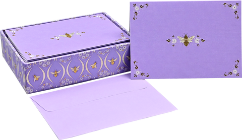 Purple stationery set with matching box and envelope on a white background