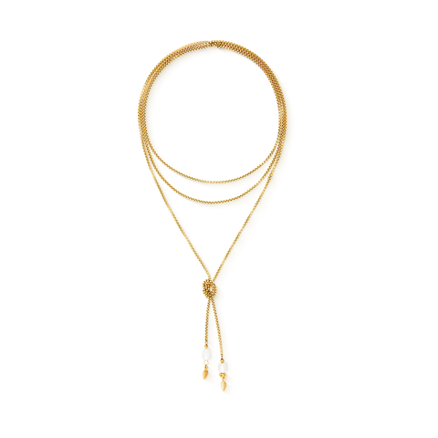 Gold necklace with a pendant on a white background