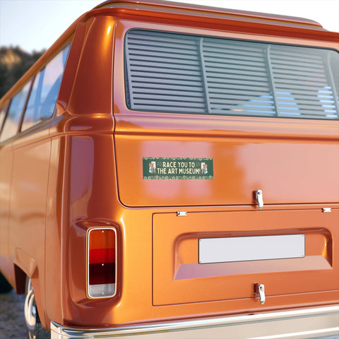 Orange van with a bumper sticker on the back