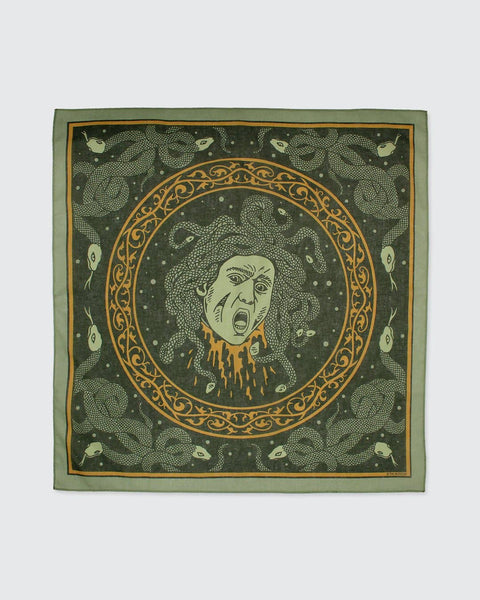 Decorative bandana with Medusa design on a green background