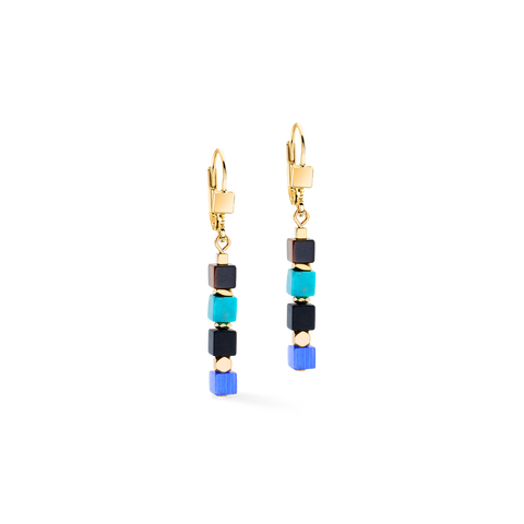 Gold earrings with blue and black beads on a white background