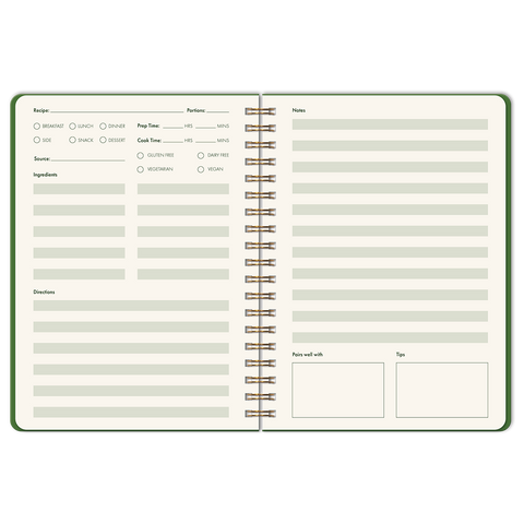 Open spiral-bound notebook with recipe and notes pages on a white background