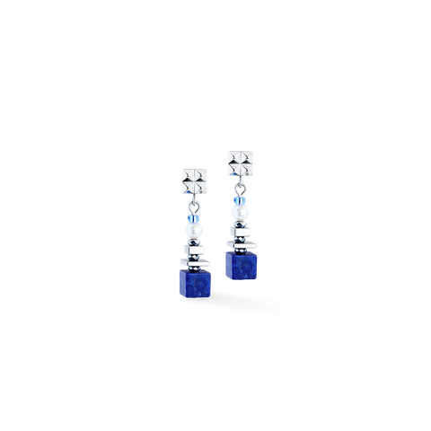 Pair of earrings with blue cube-like elements on a white background