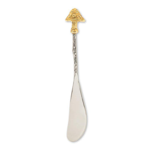 Decorative spoon with gold handle on a white background