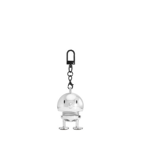 Metallic robot keychain on a white background