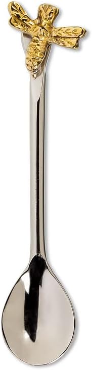 Spoon with gold bee head on a white background