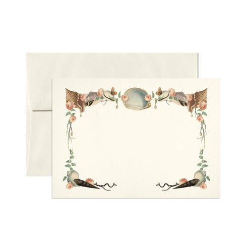 Stationery set with floral design on a white background