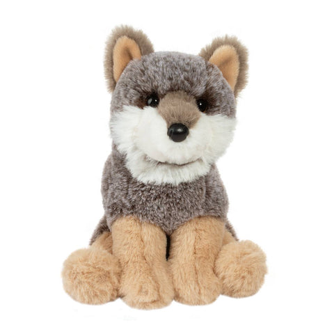Plush toy wolf on a white background