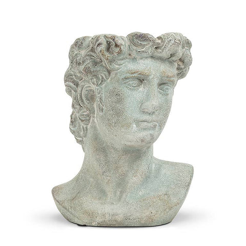 Stone bust of a classical figure on a white background