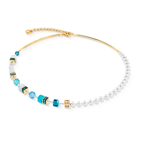 Necklace with pearls and blue beads on a white background