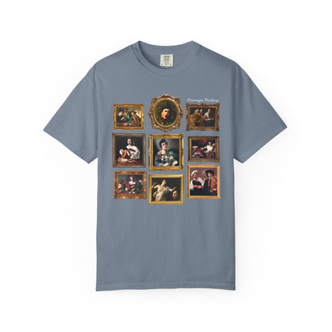 Blue t-shirt with Caravaggio paintings in frames on a white background
