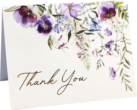 Floral card with 'Thank You' text and purple flowers on a white background