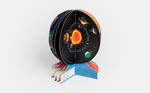 Book with the solar system on a white background