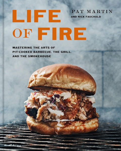 Book cover of 'Life of Fire' with a barbecue sandwich on a grill.