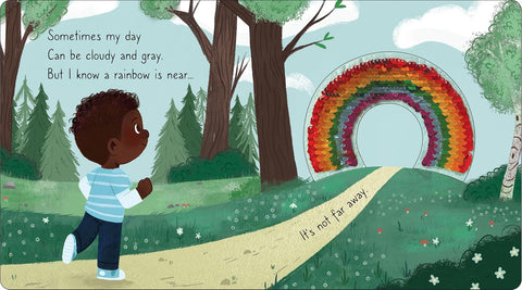 Illustration of a child walking towards a rainbow in a forest