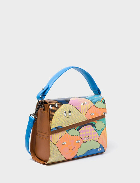 Colorful handbag with cartoonish design on a light gray background