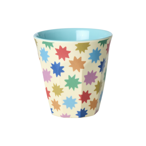 Colorful star-patterned cup on a white background