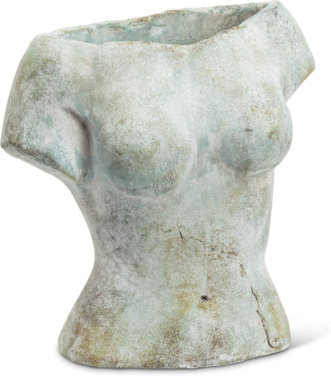 Stone sculpture of a female torso on a white background