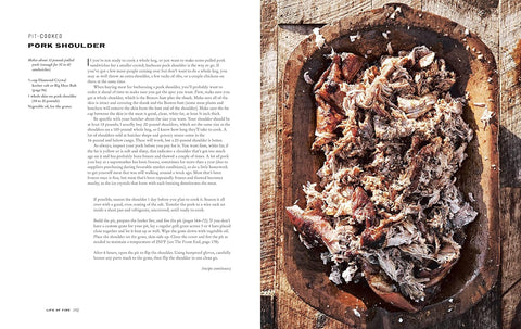 Wooden dish with shredded pork shoulder recipe on a rustic background
