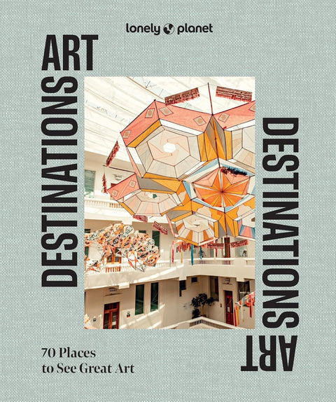 Book cover of 'Art Destinations' by Lonely Planet with a colorful art installation on a light gray background.