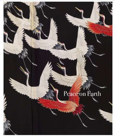 Embroidered cranes on a black background with 'Peace on Earth' text.