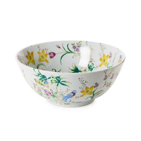 Decorative ceramic bowl with floral and bird design on a white background
