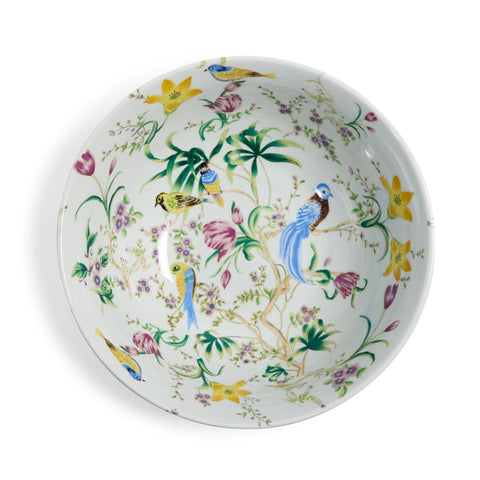 Decorative plate with floral and bird design on a white background