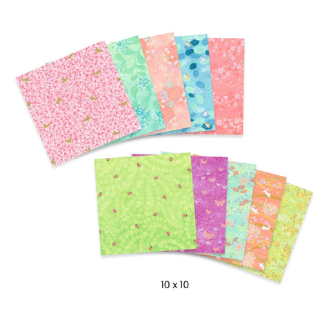 Set of colorful patterned paper sheets on a white background