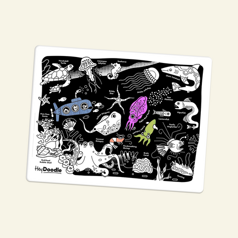 Colorful underwater scene with various sea creatures on a black background, featuring the brand 'Hey Doodler'.