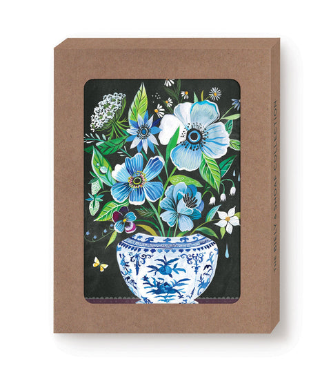 Note cards with floral design on a brown box.