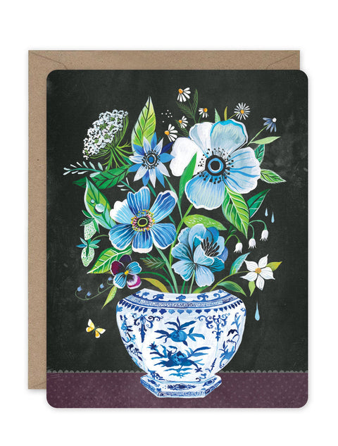 Greeting card with blue floral design on a black background