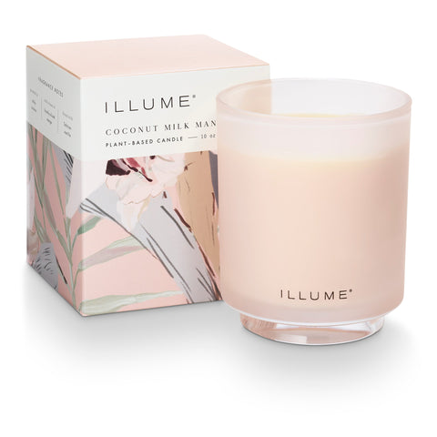 ILLUME coconut milk candle with packaging on a white background