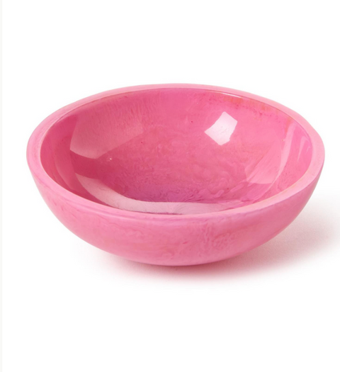 Pink ceramic bowl on a white background