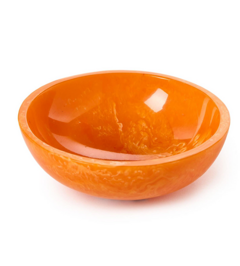 Orange ceramic bowl on a white background