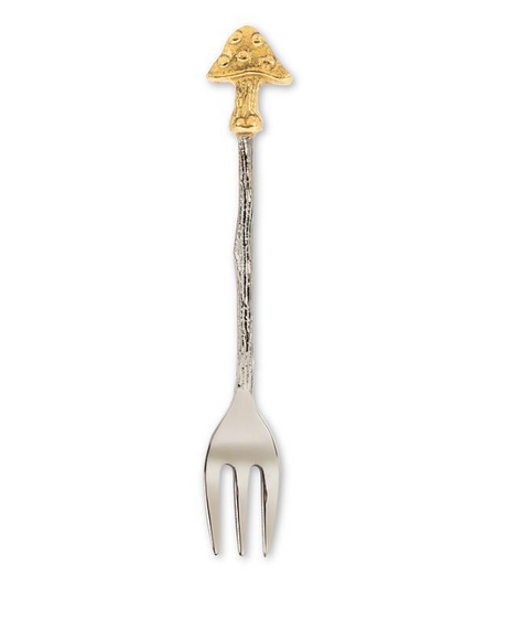 Decorative fork with a gold mushroom on top on a white background