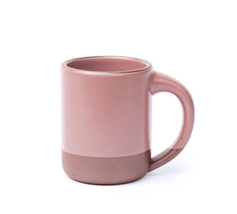 Pink ceramic mug on a white background