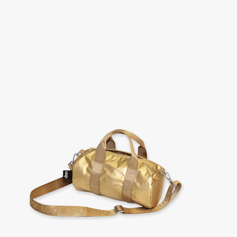 Gold duffel bag with a strap on a white background
