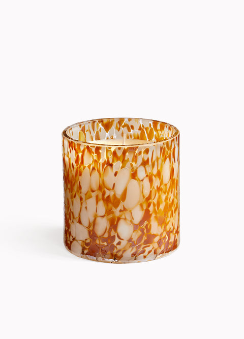 Marbled glass candle holder with brown and beige pattern on a white background