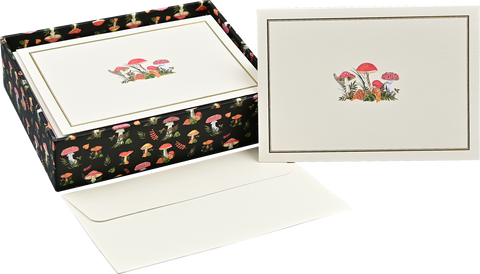 Set of stationery with mushroom design on a black box and white card.
