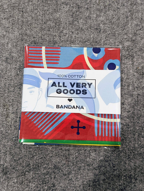 Packaged bandana with colorful design and 'All Very Goods' branding on a gray surface.