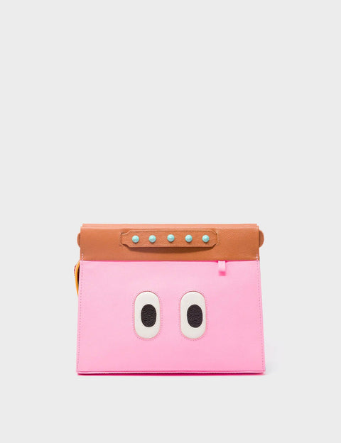 Pink pouch with a brown handle on a light gray background