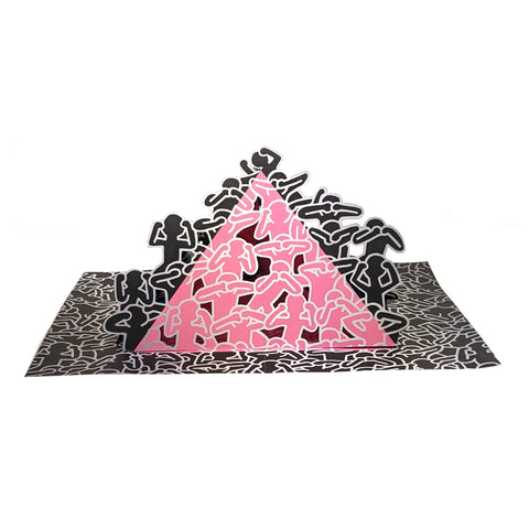 3D paper sculpture of a pyramid with pink center and black patterns on a white background