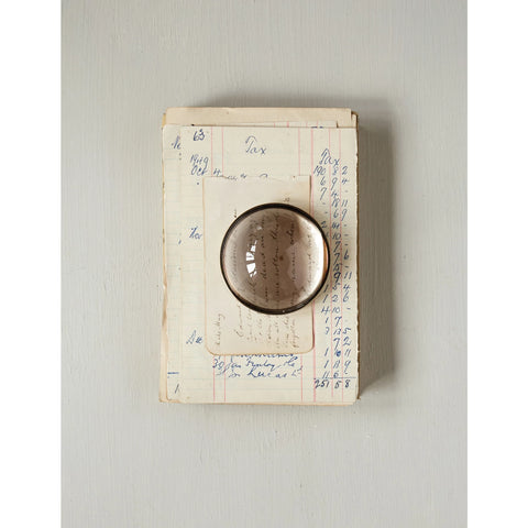 Paperweight and Magnifying Glass
